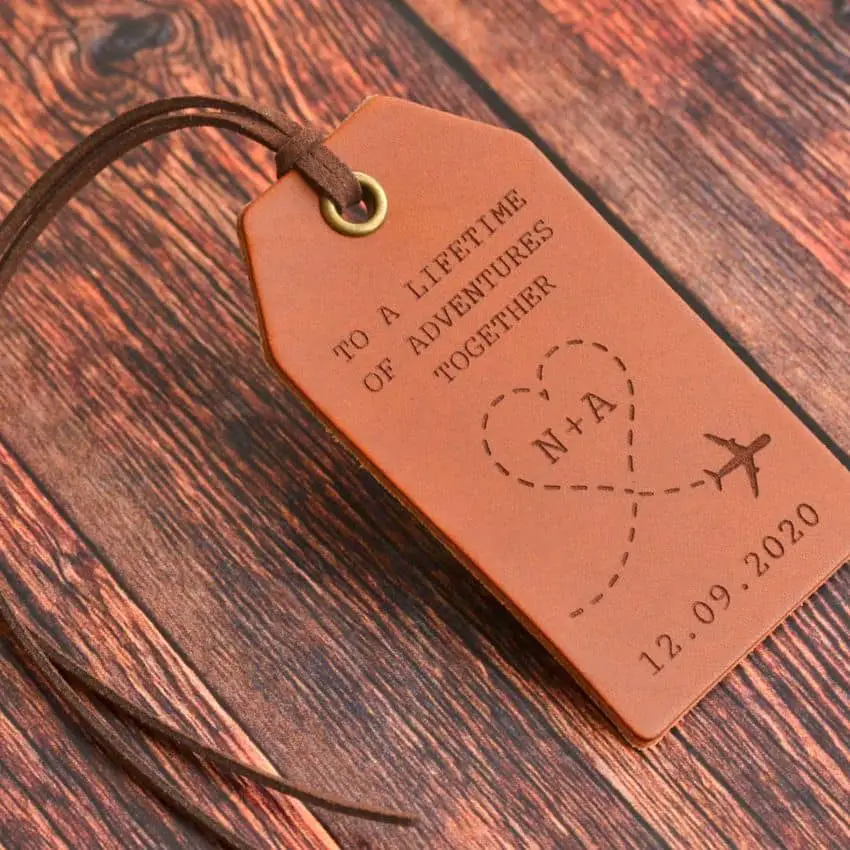 Custom Leather Luggage Tag by ShowstopperSupplies on Etsy - 40+ Best honeymoon gift ideas for the wedding couple - The Wedding Club