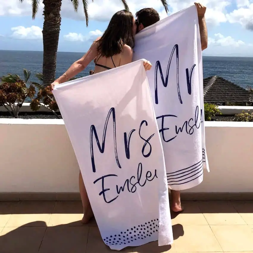 Personalised Wedding Beach Towels by Solesmith on Etsy - 40+ Best honeymoon gift ideas for the wedding couple - The Wedding Club