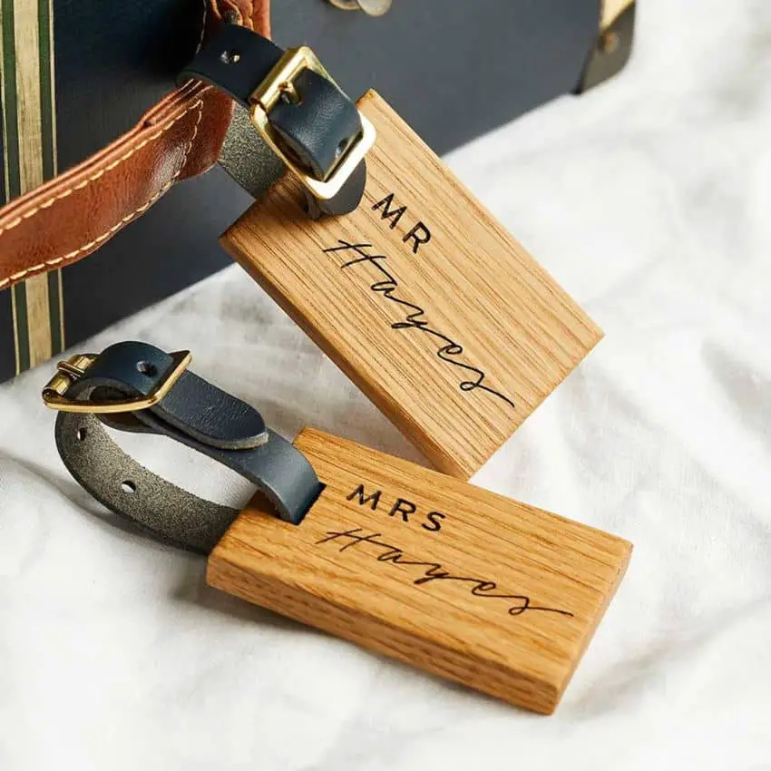 Wooden Luggage Tag Set by CreateGiftLove on Etsy - 40+ Best honeymoon gift ideas for the wedding couple - The Wedding Club